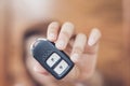 Women Hand Holding Car Remote Control Key Royalty Free Stock Photo