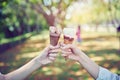 Women hand holding an ice cream collide and happy. the time of relaxation