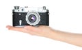 Women hand holding retro photo camera, isolated on transparent background, front view, retro things concept