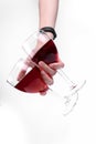 A women hand holding two glasses of red wine on white background Royalty Free Stock Photo