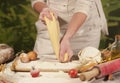 Women baker hands recipe flour kneading pasta butter, tomato preparation dough and making bread Royalty Free Stock Photo