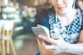 Women hand are listening to music from mobile phones. Royalty Free Stock Photo