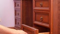 Women hand open old wooden antique chest of