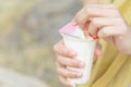 Women hand opening the fruit salad soy milk jelly, yogurt, dessert, healthy, sweet, yummy Royalty Free Stock Photo