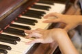 Women Hand playing antique piano classic