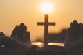 Women hand pray to God with the Bible and the cross of the morning. Woman Pray for god blessing to wishing have a better life.