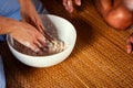 Women hand thresh flour in enameled bowl for make cooking dessert