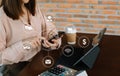 women hand working with laptop computer, tablet and smart phone in modern office with virtual icon diagram at modern office Royalty Free Stock Photo