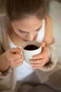 Women hands holding cup with hot coffee Royalty Free Stock Photo