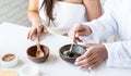 women hands making facial mask doing spa procedures Royalty Free Stock Photo