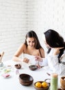 Women hands making facial mask doing spa procedures Royalty Free Stock Photo