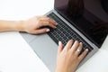 Women hands on the top of the table over laptop keyboard Royalty Free Stock Photo