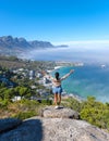 women at the viewpoint over Camps Bay named The Rock in Cape Town South Africa