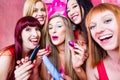 Women having bachelorette party with sex toys