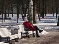 A women having rest in the park in early spring