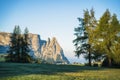 Women hiker on trail path and epic landscape of Seceda peak in Dolomites Alps, Odle mountain range, South Tyrol, Italy Royalty Free Stock Photo