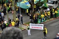 Women hold the banner written: `1st article of the federal constitution: All power emanates from the people` in the demonstration