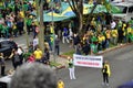 Women hold the banner written: 1st article of the federal constitution: `All power emanates from the people` in the midst of the c