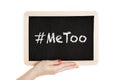 Women holding chalkboard with metoo sign in their hands