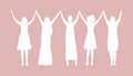 Women holding hands. White silhouettes of women on pink background. Female solidarity. International Women\'s Day