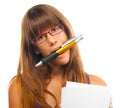 Women holding huge pencil between her teeth Royalty Free Stock Photo