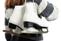 Women holding ice skates