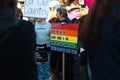 Women holding LGBT poster in Iowa City