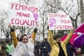 Women holding up equality signs on Womens March