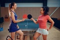 Women holds ping pong rackets, table tennis Royalty Free Stock Photo