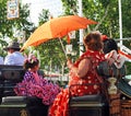 Women in a horse carriage, Seville Fair, Andalusia, Spain Royalty Free Stock Photo
