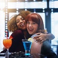 Women, hug and friends at club with drinks, having fun and bonding. Portrait, night and happy girls hugging, embrace or Royalty Free Stock Photo