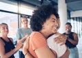 Women, hug and support of friends with group applause for counseling, therapy and trust for psychology and stress Royalty Free Stock Photo