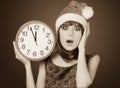 Women with huge clock Royalty Free Stock Photo