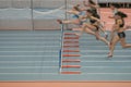 Women hurdlers race