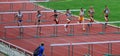 Women at the hurdles race Royalty Free Stock Photo