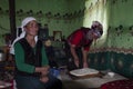 Women inside a yourt near the Karakul Lake, in the Xinjiang Province