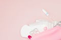 Women intimate hygiene products - sanitary pads and tampons on pink background, copy space. Menstrual period concept. Top view, Royalty Free Stock Photo