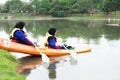 Women kayaking in the Taman Tasik Cempaka lake in the morning