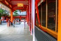 Women in kimono Japanese dress ringing bells praying for good luck