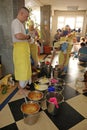 Women kitchen workers preparing to distribute Prasad for parishioners in the temple. Prasad - food that is a religious