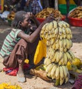 Women from Konso tribal area sell bananas at local village market. Omo Valley. Ethiopia