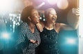 Women, laughing or phone selfie on party dance floor in nightclub event, bokeh disco or birthday celebration. Smile Royalty Free Stock Photo