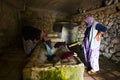 Women who wash dirty clothes in an old-style laundry