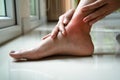 Women leg ankle injury/painful, women touch the pain ankle leg Royalty Free Stock Photo