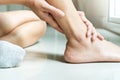 Women leg ankle injury/painful, women touch the pain ankle leg Royalty Free Stock Photo