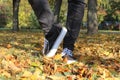 Women legs with sneakers inspired ballet movement