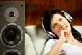 Women listening music in headphones Royalty Free Stock Photo