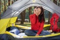 Women listening to music camping tent