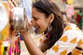 Women looking into bioscope at Surajkund Mela