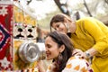 Women looking into bioscope at Surajkund Mela